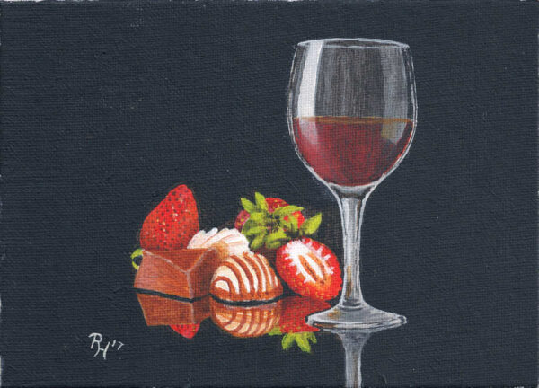 Stillleben mit Erdbeeren, Pralinen und einem Glas Rotwein